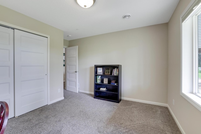 14246 Wilds Dr NW, Prior Lake, MN 55372 - unfurnished bedroom featuring carpet and a closet