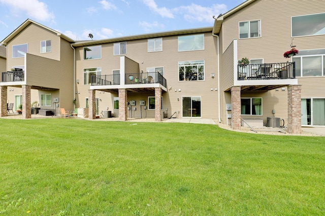 14246 Wilds Dr NW, Prior Lake, MN 55372 - rear view of house with a yard