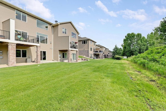 14246 Wilds Dr NW, Prior Lake, MN 55372 - view of grassy yard featuring a residential view and a balcony