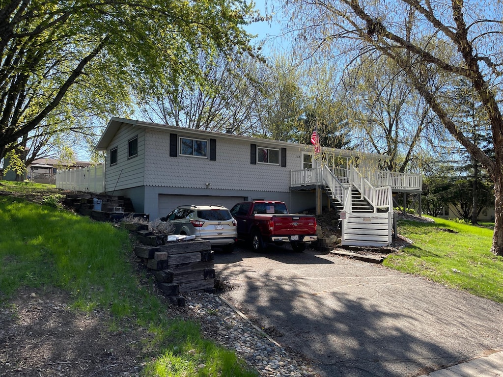 188 Tower Heights Rd, Prescott, WI 54021 - view of front of home featuring stairway, an attached garage, and driveway