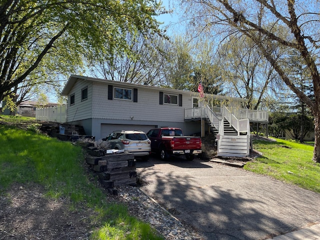 188 Tower Heights Rd, Prescott, WI 54021 - view of front of home featuring stairway, an attached garage, and driveway