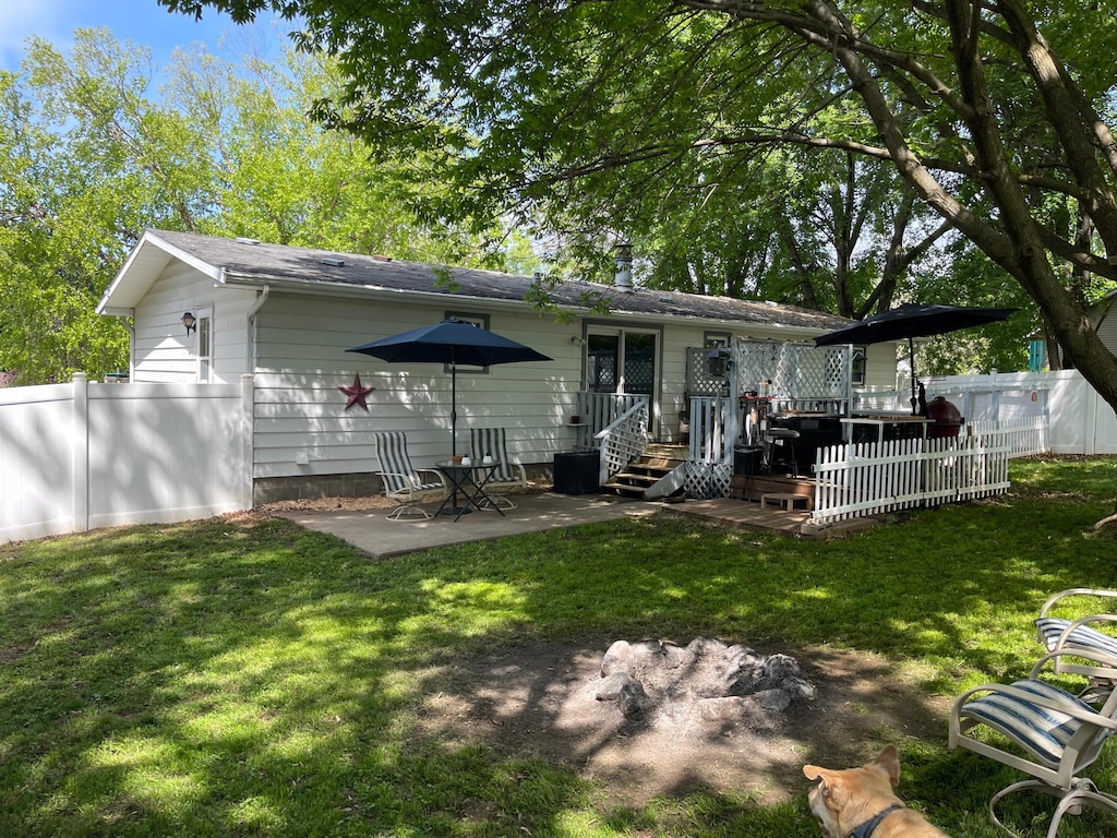 188 Tower Heights Rd, Prescott, WI 54021 - rear view of house with a patio and a wooden deck