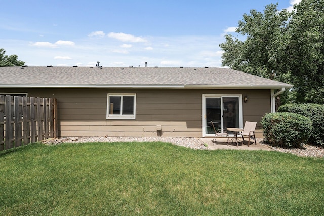 701 Auburn Pl NW, Elk River, MN 55330 - rear view of house with a patio area and roof with shingles