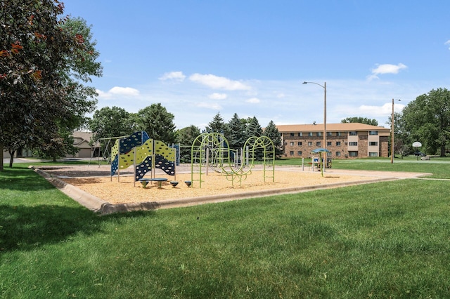 701 Auburn Pl NW, Elk River, MN 55330 - community jungle gym featuring a lawn