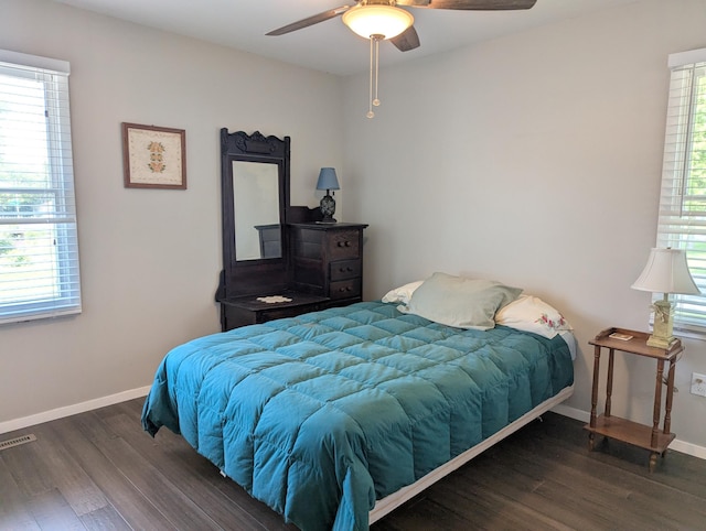 702 Hills Ln, Albert Lea, MN 56007 - bedroom with wood finished floors, baseboards, and a ceiling fan