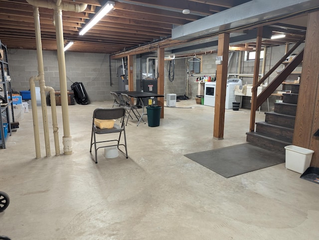 702 Hills Ln, Albert Lea, MN 56007 - unfinished below grade area with washer and dryer and stairway