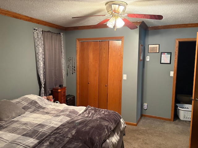 505 Lindquist St W, Onamia, MN 56359 - bedroom with a closet, carpet, a textured ceiling, ornamental molding, and a ceiling fan