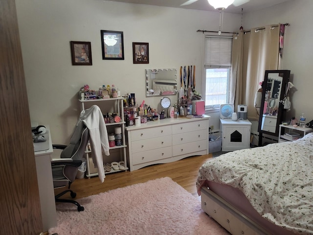 505 Lindquist St W, Onamia, MN 56359 - bedroom with wood finished floors and a desk