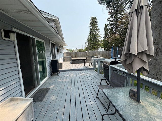 505 Lindquist St W, Onamia, MN 56359 - wooden deck with a fenced backyard