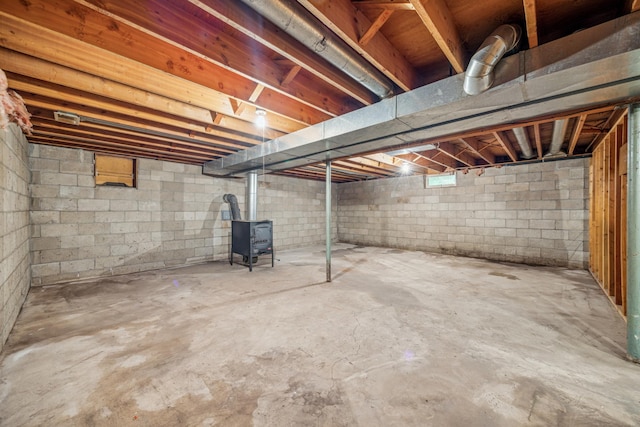4399 124th Ave, Clear Lake, MN 55319 - unfinished below grade area with a wood stove
