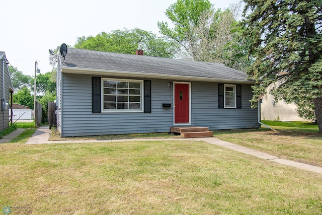 1614 2nd St N, Fargo, ND 58102 - bungalow-style house with a front lawn, a chimney, and a shingled roof