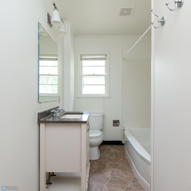 1614 2nd St N, Fargo, ND 58102 - bathroom featuring vanity, toilet, and washtub / shower combination