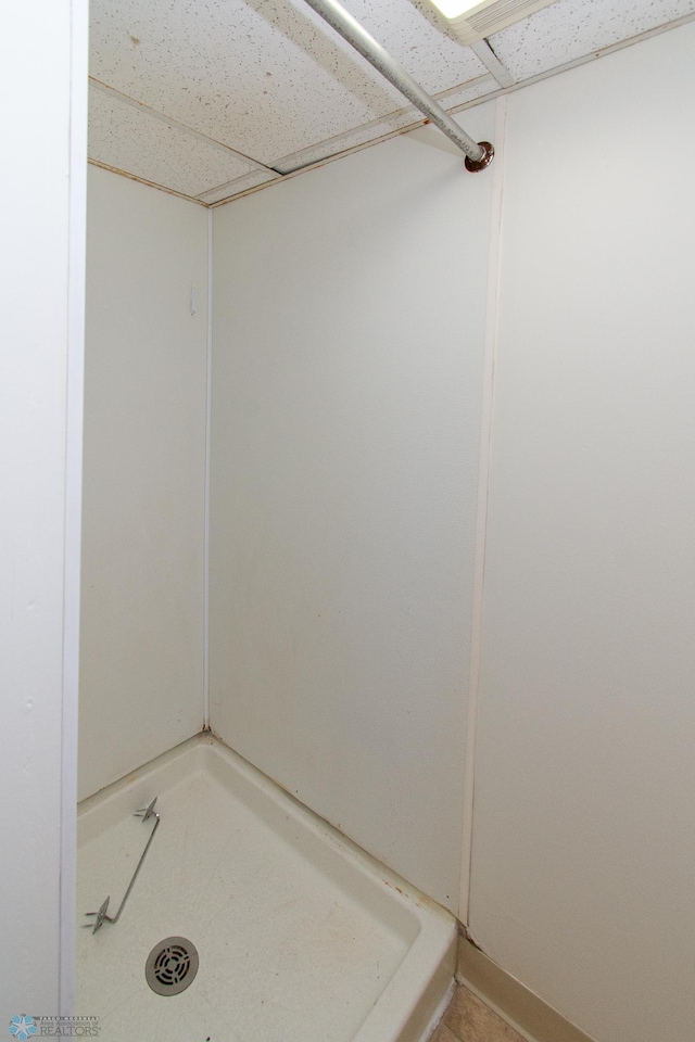 1614 2nd St N, Fargo, ND 58102 - full bath featuring a shower and a drop ceiling