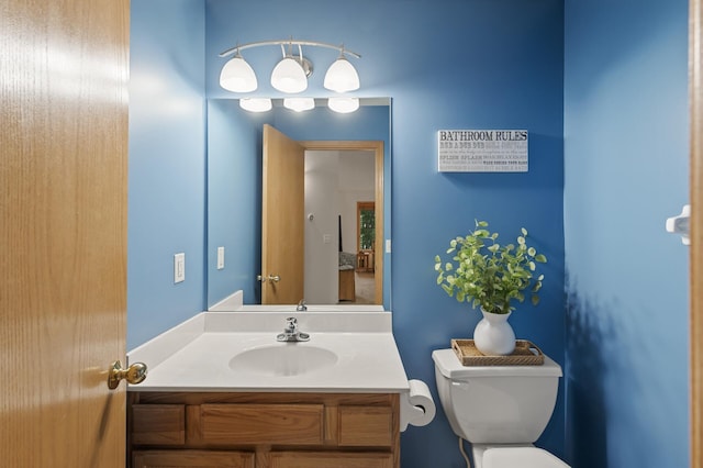 13408 Ximines Ln N, Champlin, MN 55316 - half bathroom featuring toilet and vanity