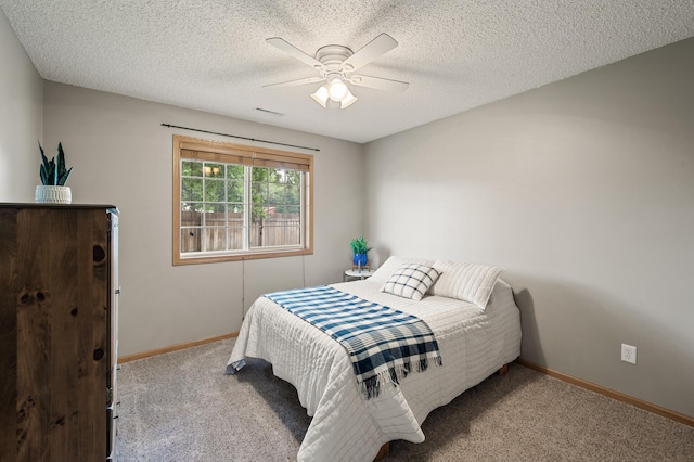 13408 Ximines Ln N, Champlin, MN 55316 - carpeted bedroom featuring a ceiling fan and a textured ceiling