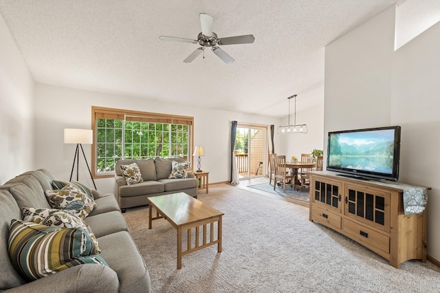 13408 Ximines Ln N, Champlin, MN 55316 - living area with light carpet, a textured ceiling, a ceiling fan, and lofted ceiling