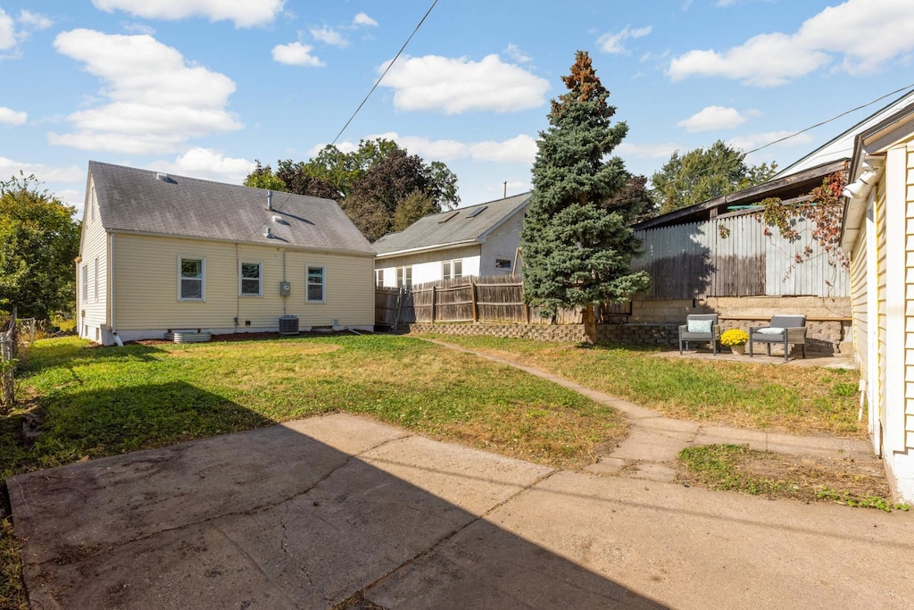 3235 Ulysses St NE, Minneapolis, MN 55418 - view of yard featuring a patio