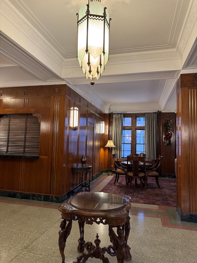 2615 Park Ave Unit 320, Minneapolis, MN 55407 - interior space featuring a chandelier, speckle patterned floor, crown molding, and wooden walls