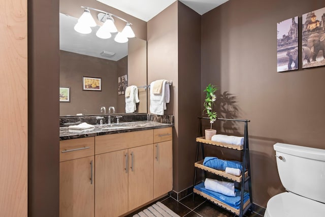 215 10th Ave S Unit 730, Minneapolis, MN 55415 - half bath with vanity and tile patterned floors