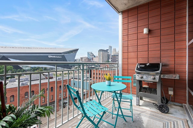215 10th Ave S Unit 730, Minneapolis, MN 55415 - balcony featuring a grill and a view of skyline