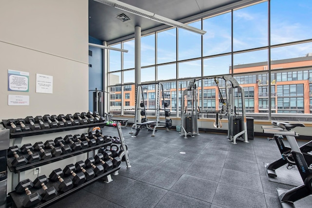 215 10th Ave S Unit 730, Minneapolis, MN 55415 - workout area with a high ceiling and floor to ceiling windows