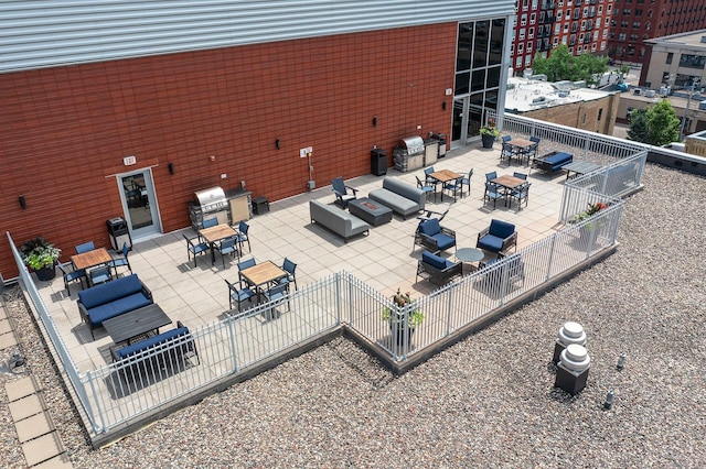 215 10th Ave S Unit 730, Minneapolis, MN 55415 - view of patio / terrace with an outdoor hangout area, area for grilling, and outdoor dining area