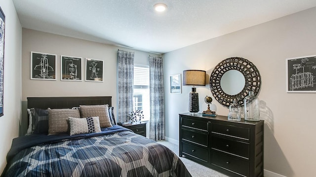 8863 Jorgensen Ave S, Cottage Grove, MN 55016 - carpeted bedroom featuring baseboards