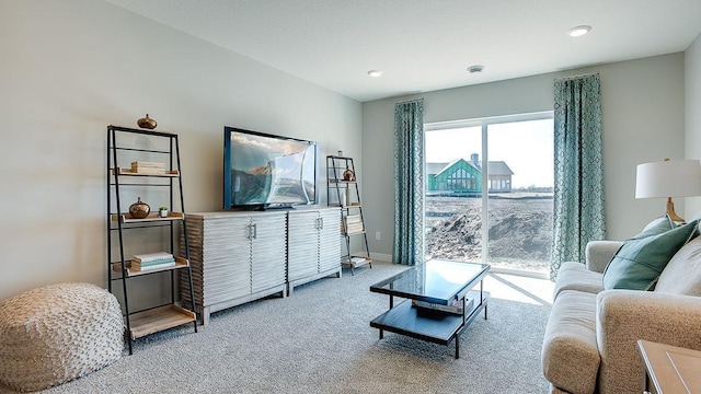 8863 Jorgensen Ave S, Cottage Grove, MN 55016 - living room featuring light carpet, recessed lighting, and baseboards