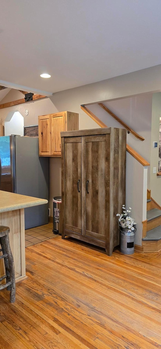 526 Mound St, Owatonna, MN 55060 - kitchen with light wood-style floors, freestanding refrigerator, recessed lighting, and light countertops