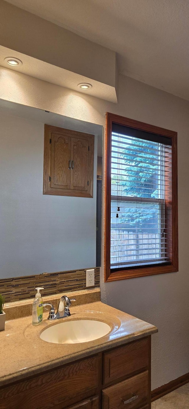 526 Mound St, Owatonna, MN 55060 - bathroom featuring vanity and baseboards
