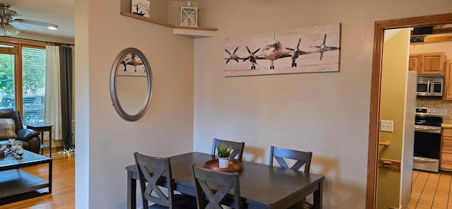 526 Mound St, Owatonna, MN 55060 - dining room featuring ceiling fan and light wood-style flooring