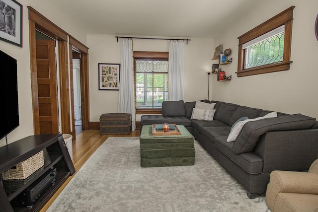 1023 Avon St N, Saint Paul, MN 55103 - living area with wood finished floors and crown molding