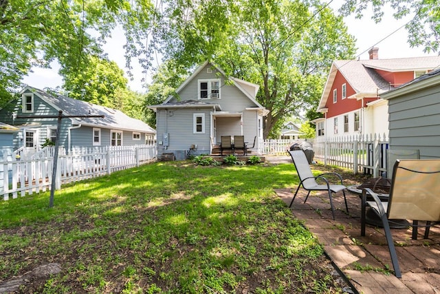 1023 Avon St N, Saint Paul, MN 55103 - rear view of property with a fenced backyard