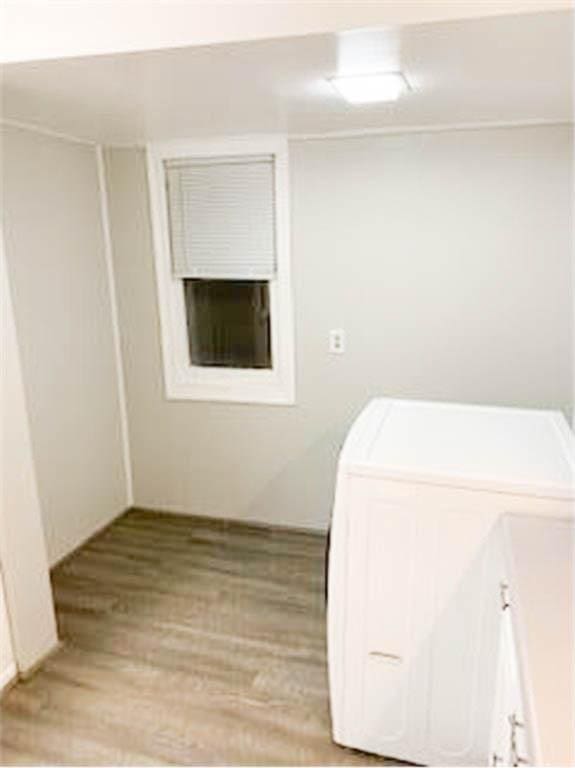 587 Bay St, Saint Paul, MN 55102 - washroom with light wood-style floors and washing machine and dryer