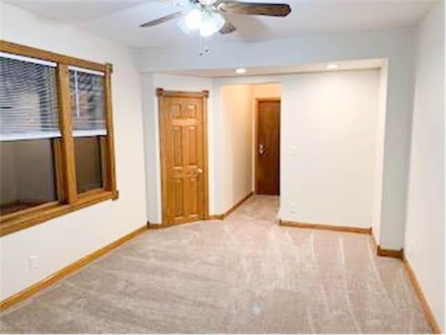 587 Bay St, Saint Paul, MN 55102 - unfurnished room featuring carpet flooring and ceiling fan