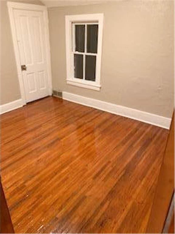 587 Bay St, Saint Paul, MN 55102 - spare room with wood finished floors