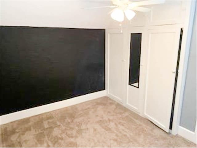 587 Bay St, Saint Paul, MN 55102 - spare room with ceiling fan and light colored carpet