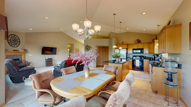 4374 Shetland Pl NW, Rochester, MN 55901 - dining area with vaulted ceiling, a chandelier, recessed lighting, light tile patterned floors, and a fireplace