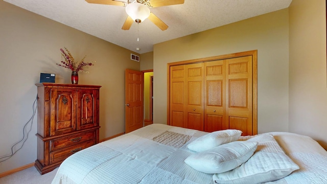 4374 Shetland Pl NW, Rochester, MN 55901 - bedroom with light carpet, a closet, a ceiling fan, and baseboards