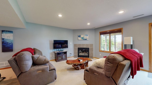 4374 Shetland Pl NW, Rochester, MN 55901 - living area with baseboards, recessed lighting, a tiled fireplace, and carpet floors