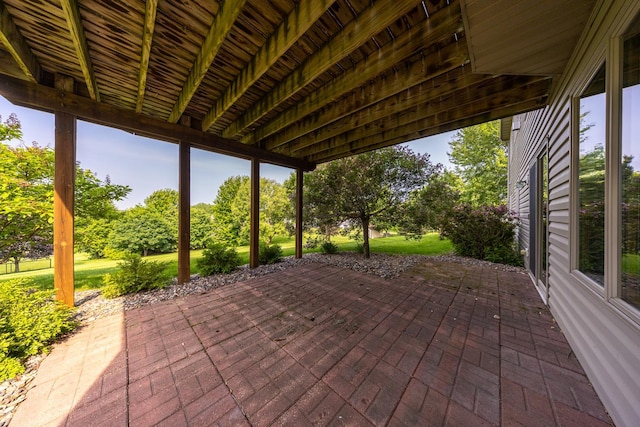 4374 Shetland Pl NW, Rochester, MN 55901 - view of patio / terrace featuring view of wooded area