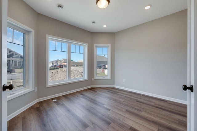 15354 112th Ave N, Dayton, MN 55369 - empty room featuring dark wood-style floors, baseboards, and recessed lighting