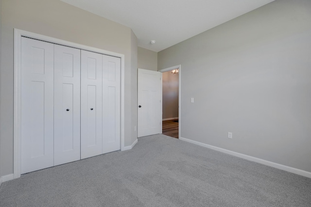 15354 112th Ave N, Dayton, MN 55369 - unfurnished bedroom featuring carpet, baseboards, and a closet