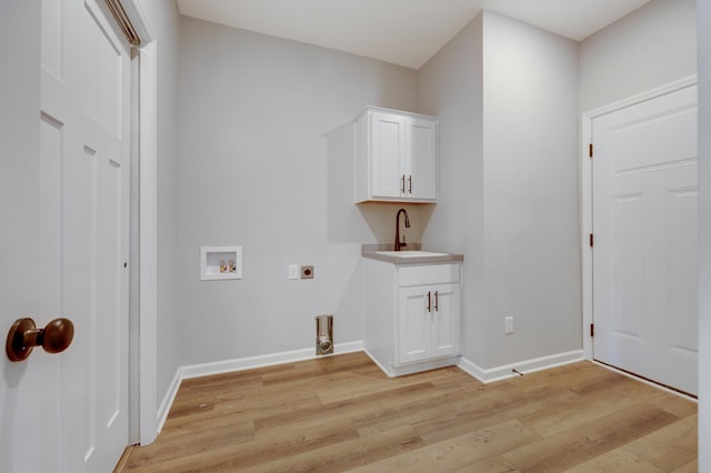 15354 112th Ave N, Dayton, MN 55369 - laundry area with electric dryer hookup, light wood-type flooring, washer hookup, and baseboards
