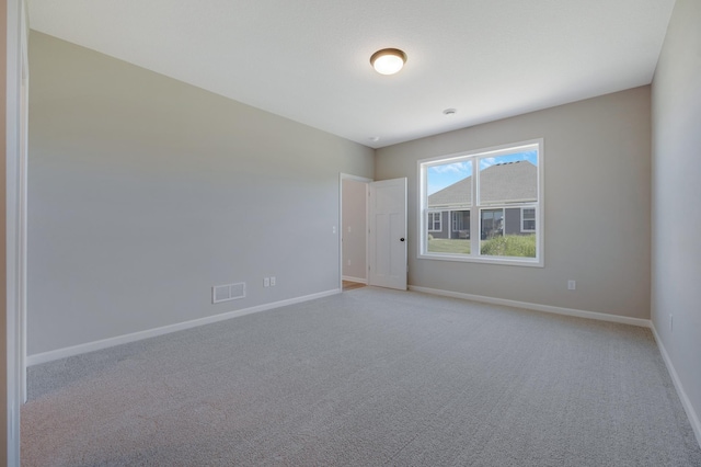 15354 112th Ave N, Dayton, MN 55369 - spare room featuring baseboards and light colored carpet
