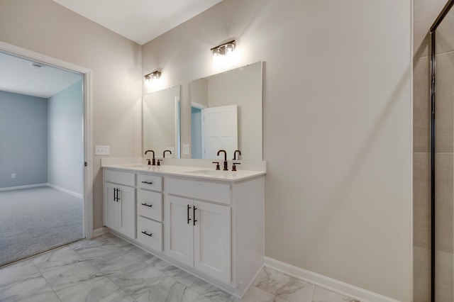 15354 112th Ave N, Dayton, MN 55369 - bathroom featuring marble look tile flooring, double vanity, and baseboards