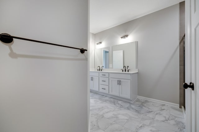 15354 112th Ave N, Dayton, MN 55369 - full bathroom with marble finish flooring, double vanity, and baseboards