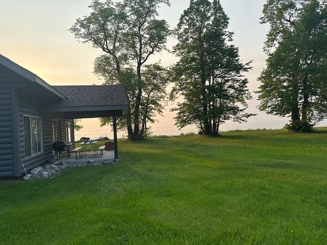 19373 Ethel Beach Rd NE, Kelliher, MN 56650 - view of green lawn with a patio area