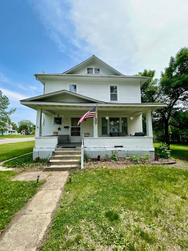 506 3rd St SW, Wadena, MN 56482 - traditional style home with a porch and a front yard