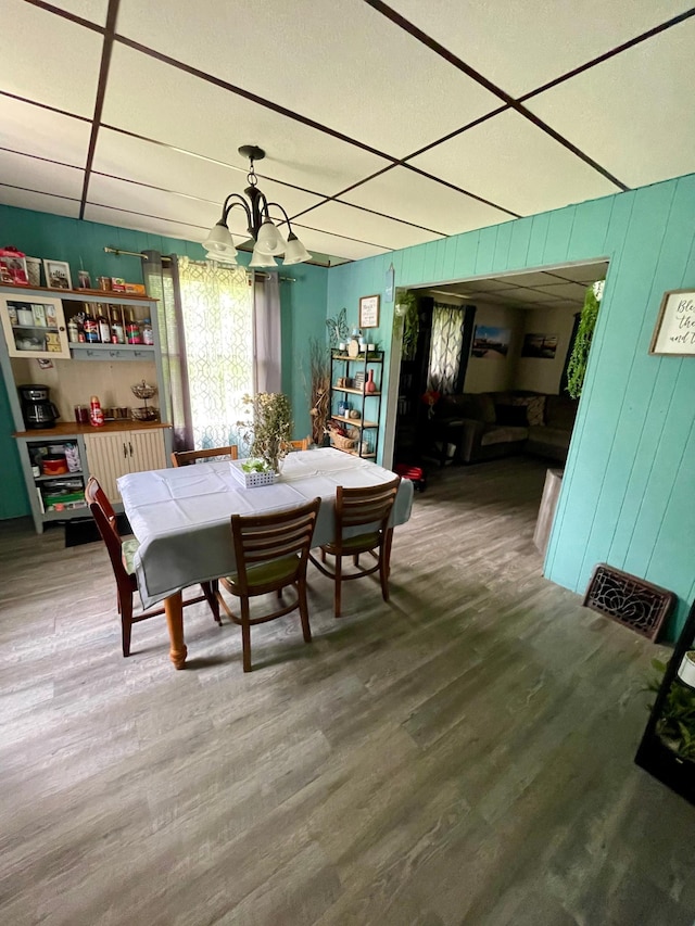 506 3rd St SW, Wadena, MN 56482 - dining room featuring a chandelier and wood finished floors